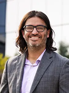 headshot of Manny Avila