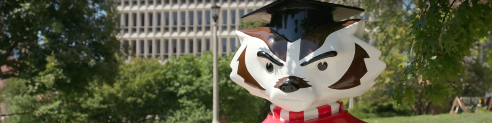 Statue of Bucky Bader in a graduation cap.