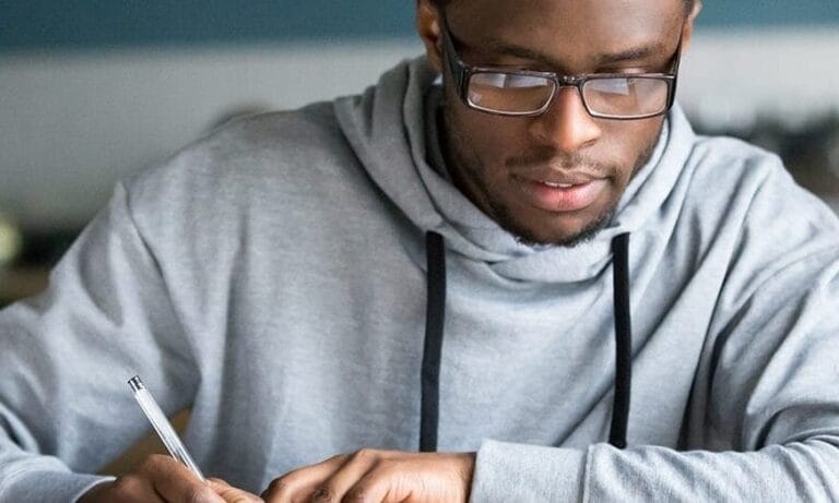 A young man working on his laptop