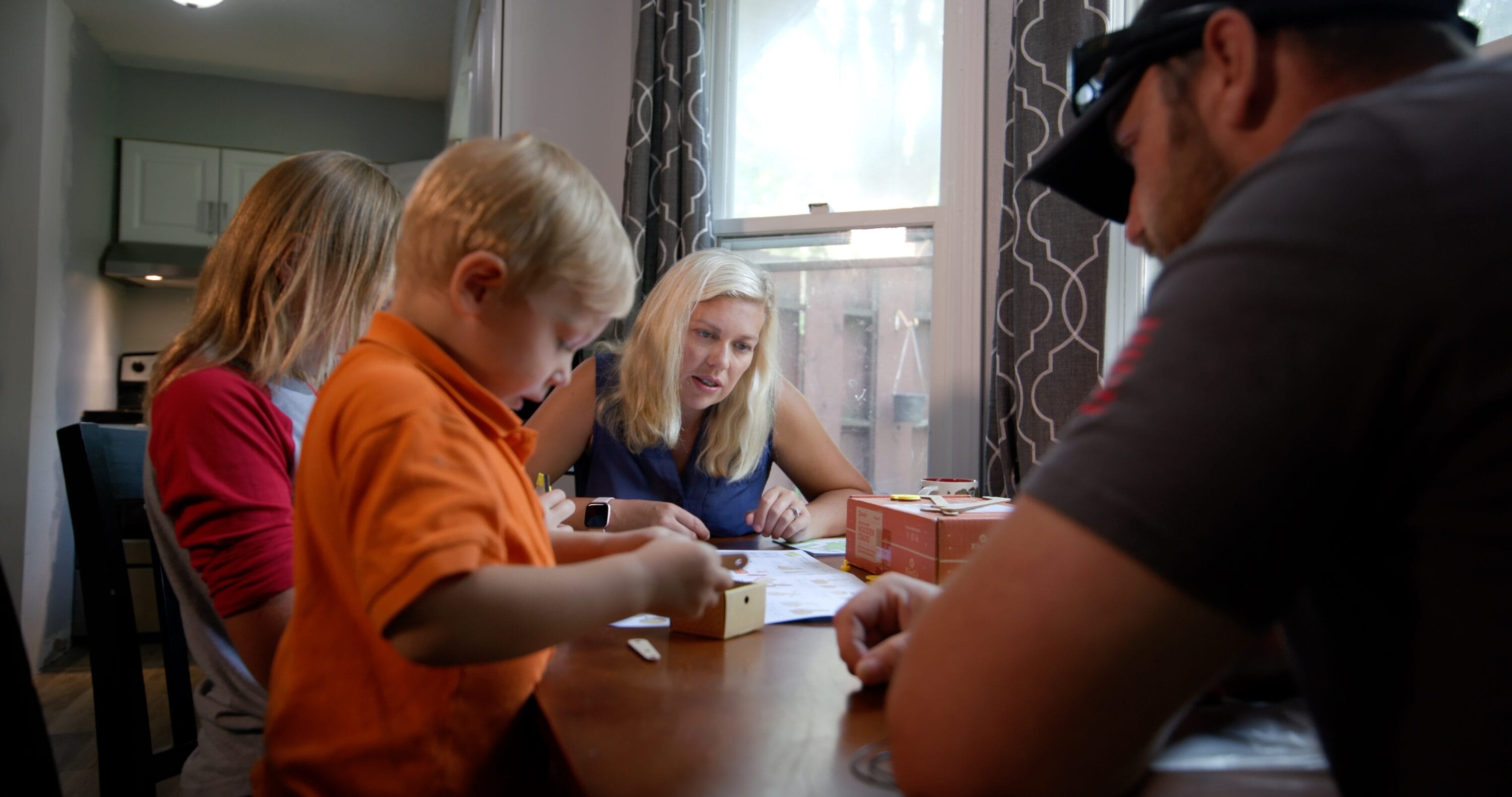 Kristen Jorgensen plays with her two children.