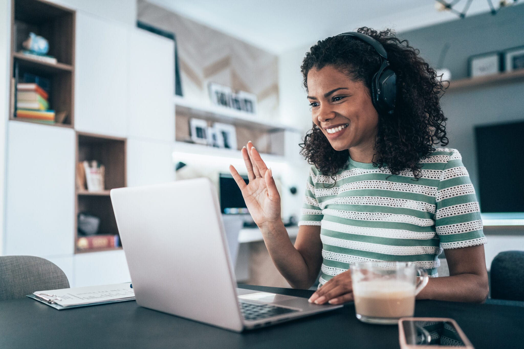 A woman having a video conferences from home.