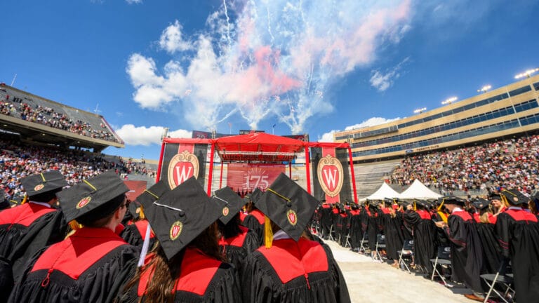 Badger graduates in caps and gowns